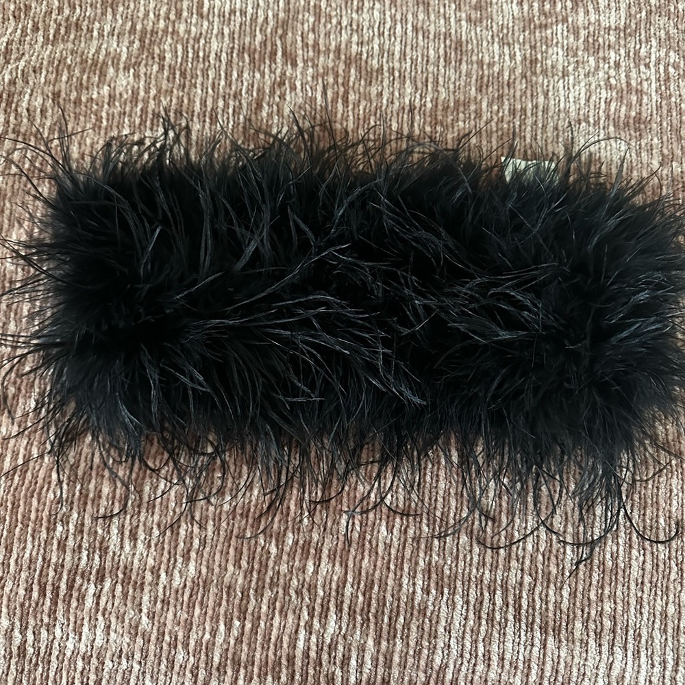 Never worn black feather top from Akira , size large